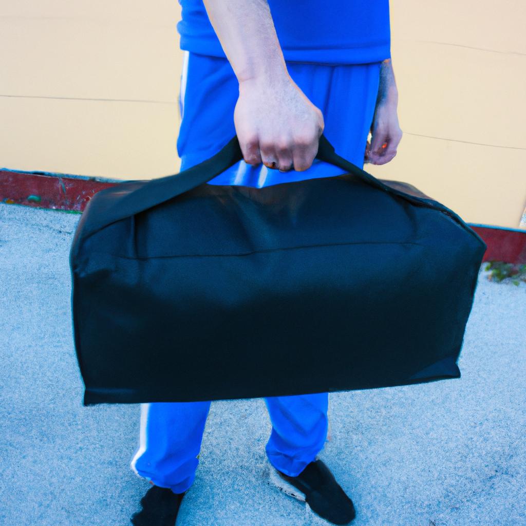 Person holding gym bag, exercising