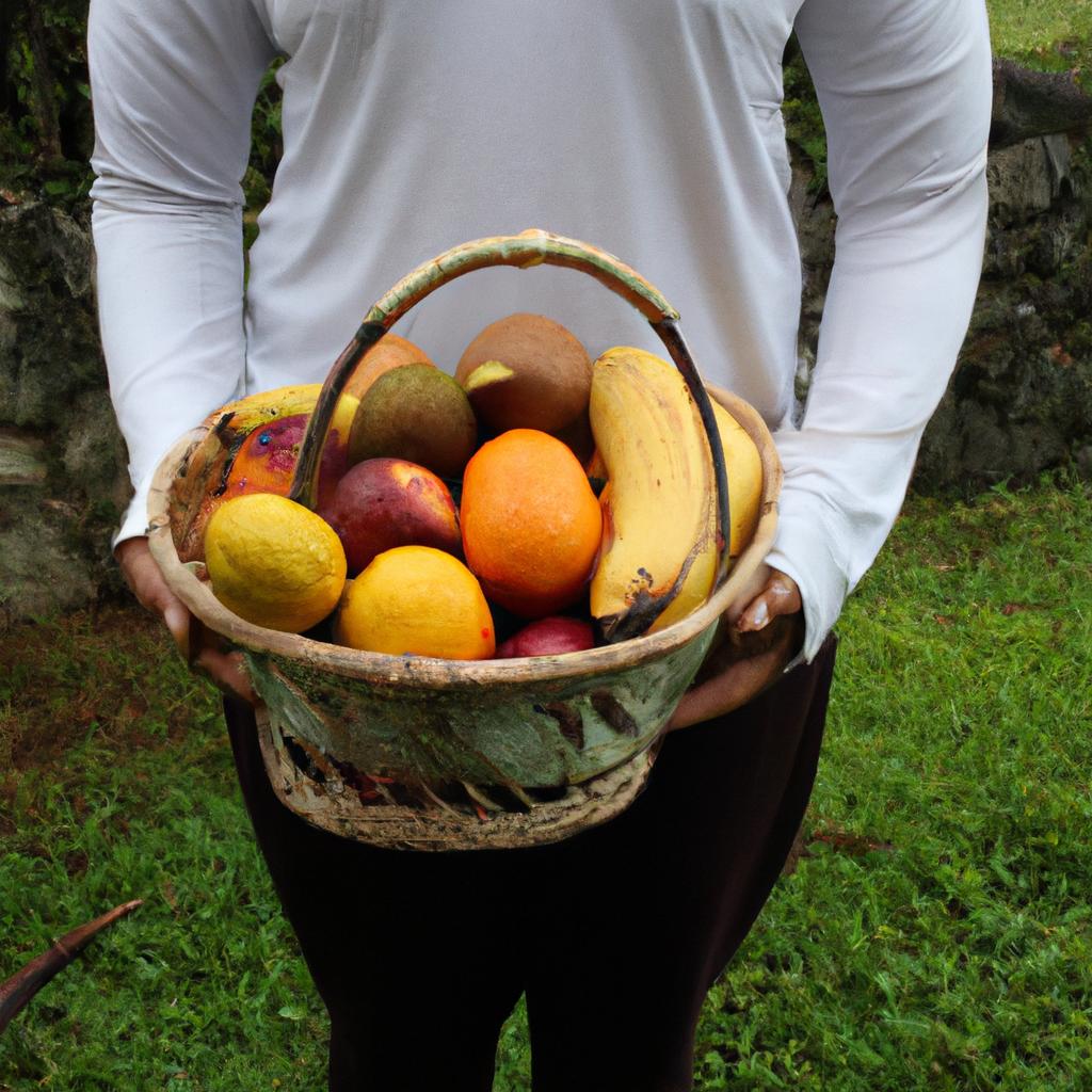 Person holding basket of fruit