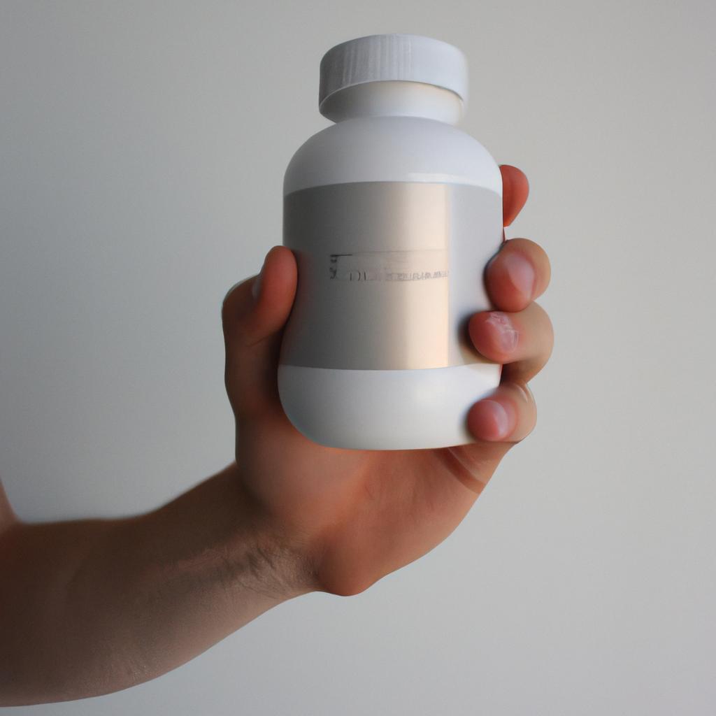Person holding dietary supplement bottle