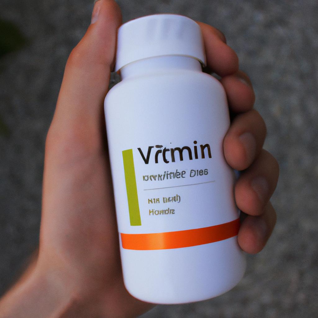 Person holding a vitamin bottle